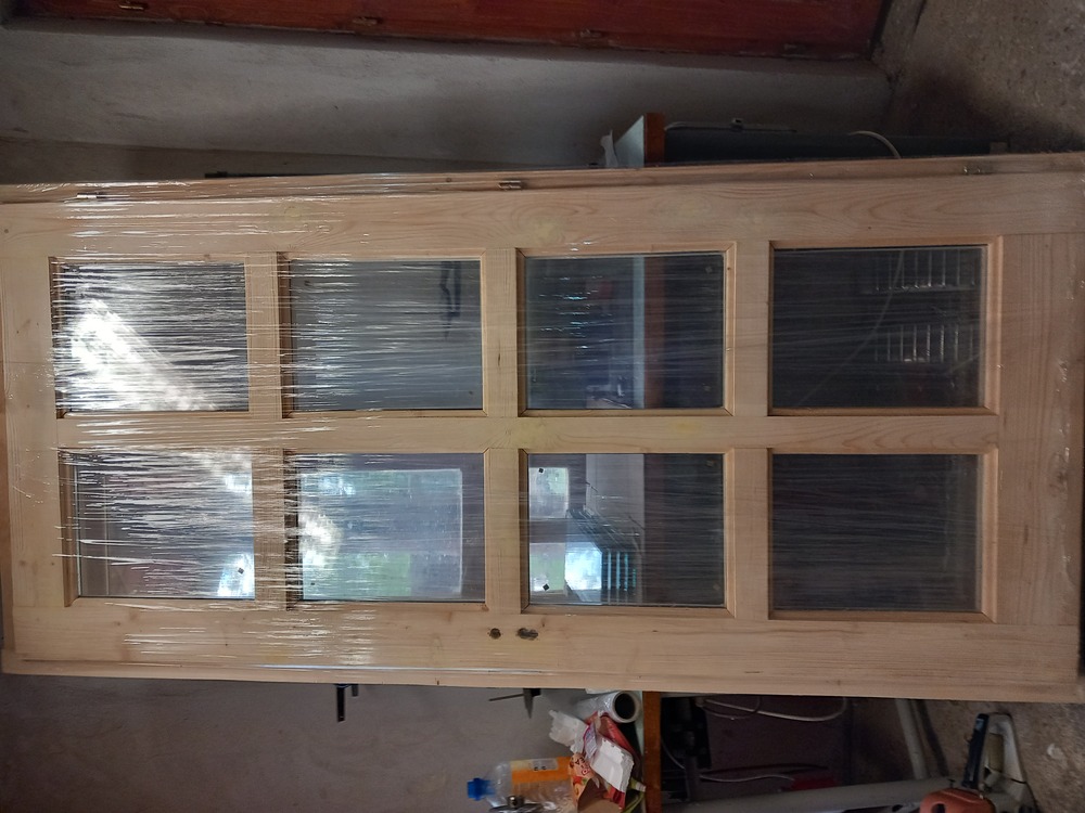 Új,100x210cm es bejárati ajtó eladó.